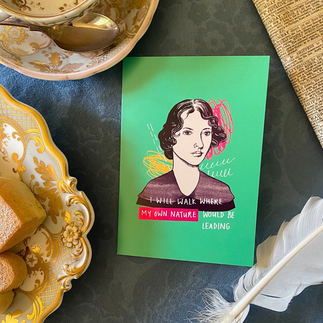 A greetings card featuring an illustration of Emily Bronte and a quote.